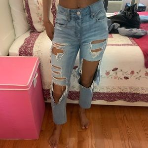 Very distressed high rise boyfriend jeans